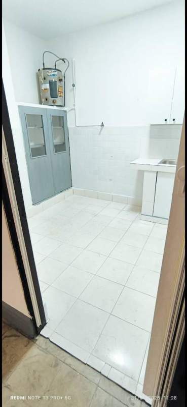 Bright living room area with tile flooring and multiple windows in PH Via Veneto El Cangrejo Panama City