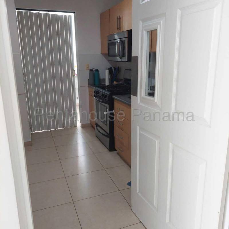 Bedroom with large window and panoramic views in Costa del Este Panama