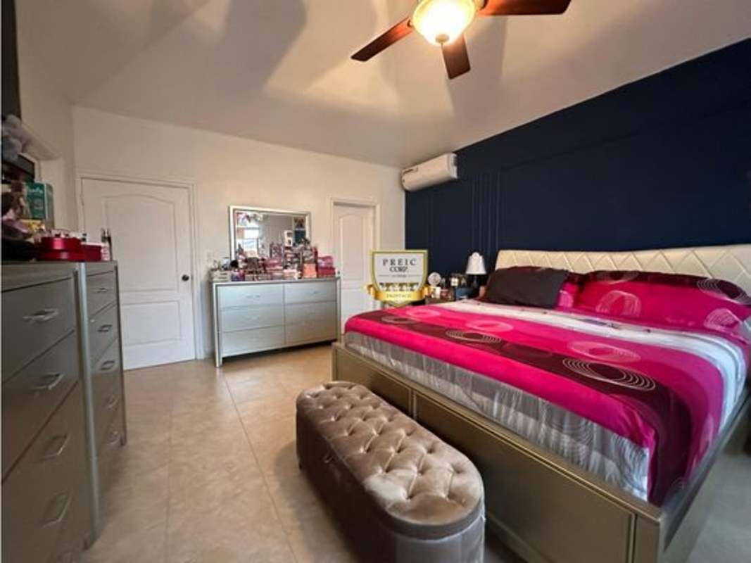 Large master suite with walk-in closet balcony ensuite bath Palmeras del Este Panama