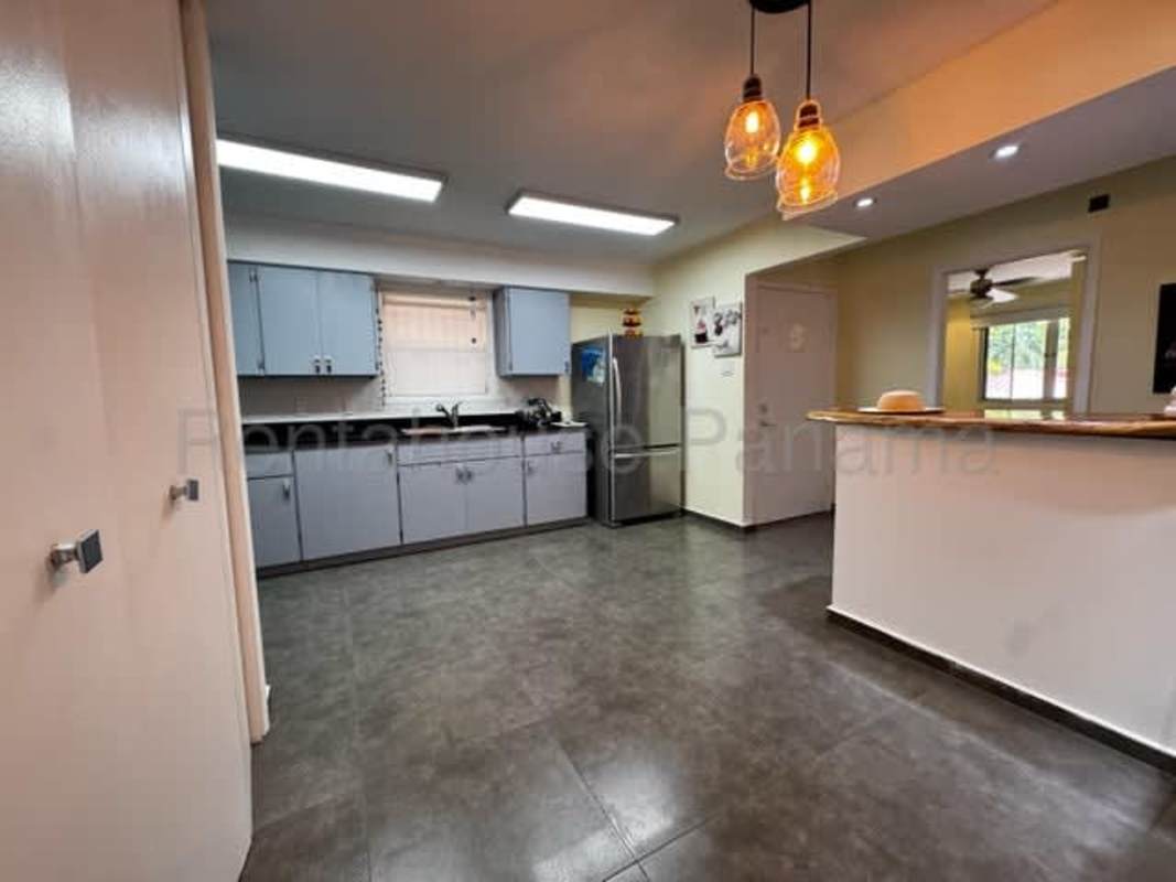 Covered balcony overlooking garden areas in PH Edificio 920 Clayton Panama City