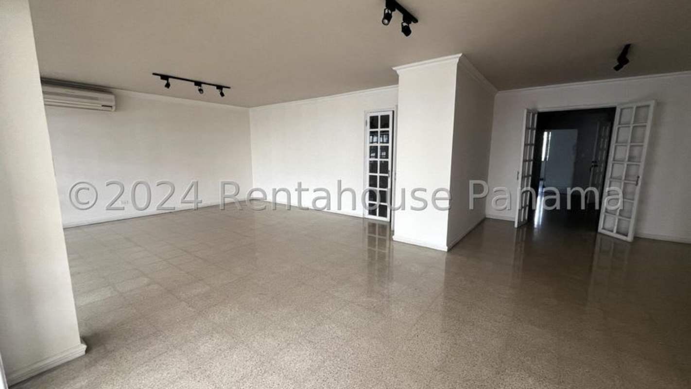 Spacious kitchen with granite countertops white cabinets in PH Girasol Marbella Panama City