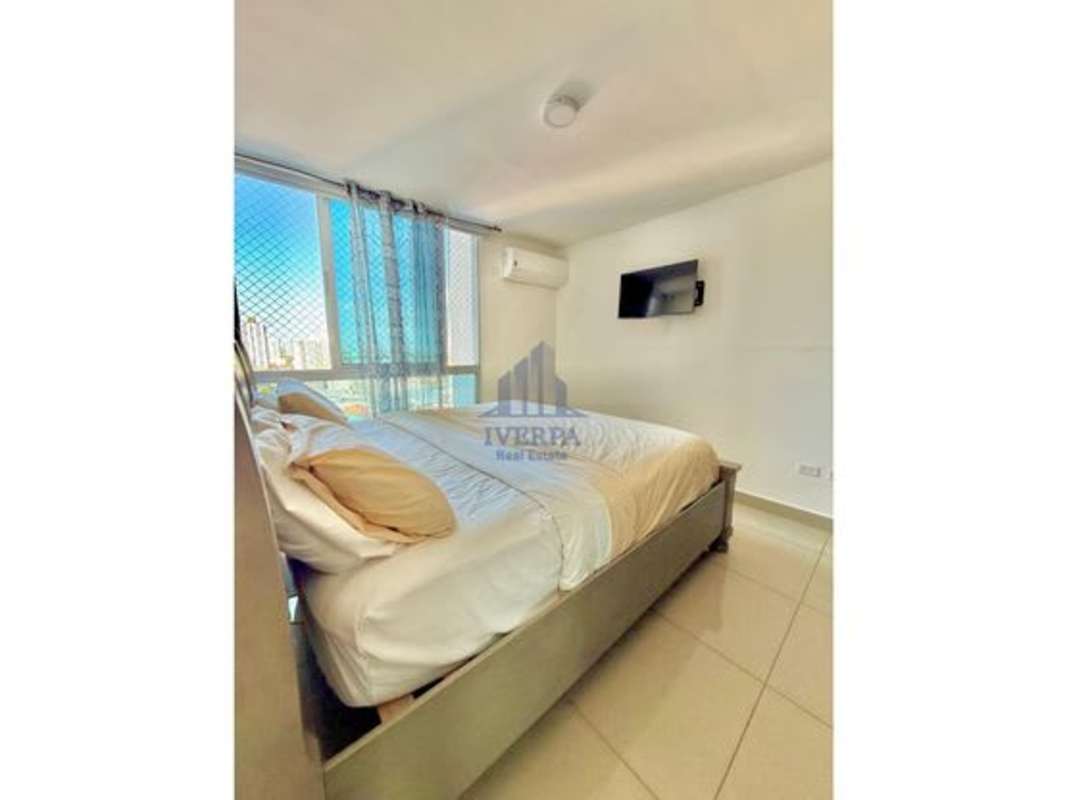 Minimalist master bedroom with AC and city view window PH Villa Vista Via España Panama