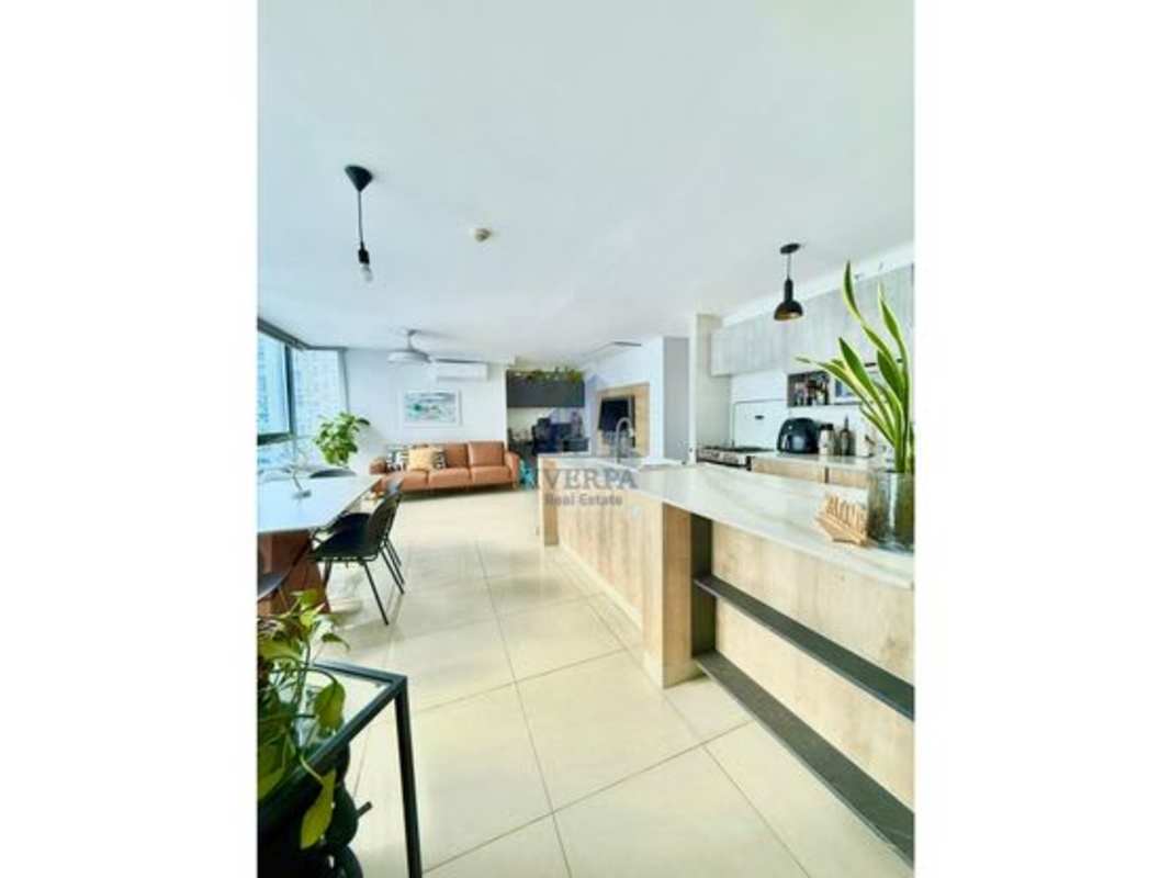 Open kitchen with breakfast bar, pendant lighting, large windows, PH Villa Vista Via España Panama