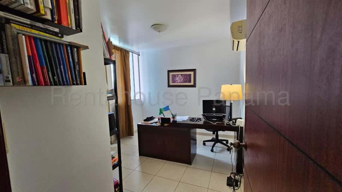 Furnished master bedroom with AC and city view in Bella Vista Panama apartment