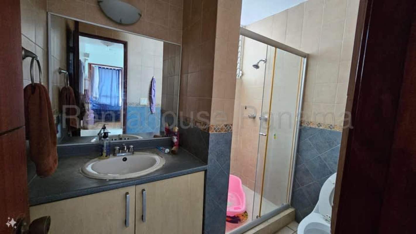 Bathroom with glass shower and contemporary design in Bella Vista Panama apartment