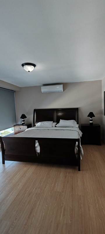 Contemporary bathroom with glass shower, vanity, decorative tile in PH Bayfront Tower Panama City