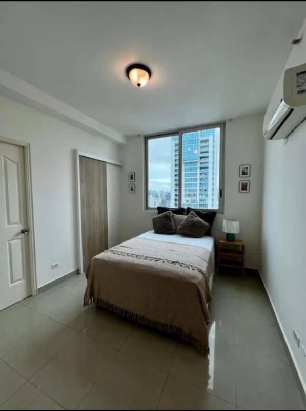 Modern furnished bedroom with city view window, air conditioning and wardrobe PH San Francisco Bay