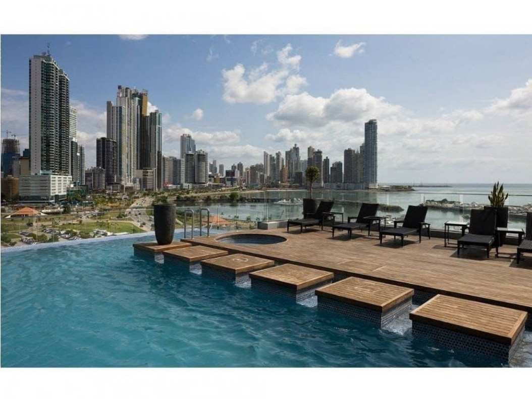 Rooftop pool deck with ocean skyline views PH Yacht Club Avenida Balboa Panama