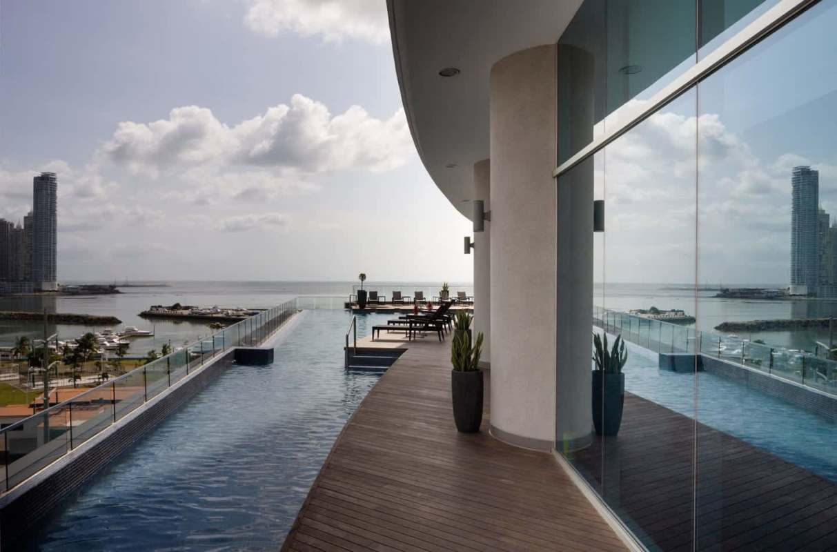 Infinity pool on rooftop with panoramic ocean and skyline views PH Yacht Club Panama City