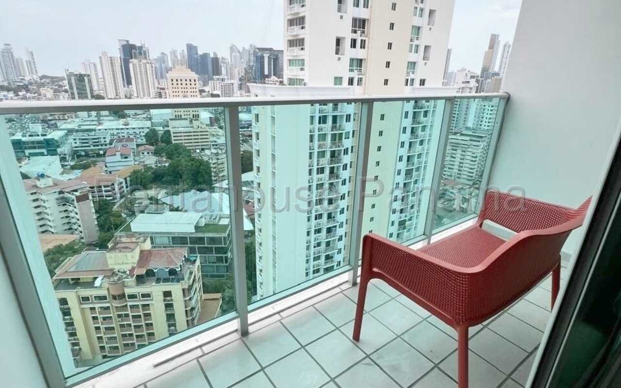 Master bedroom featuring ensuite bathroom, large closet, and windows with city view PH Trinity El Carmen