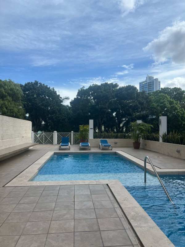 Fully equipped gym with cardio and weight machines, mirrors and garden view in PH Portanova Panama City