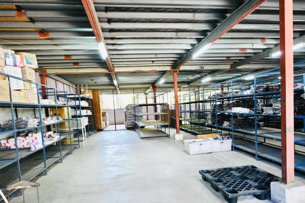 Interior storage space with racking systems inside industrial warehouse Pueblo Nuevo