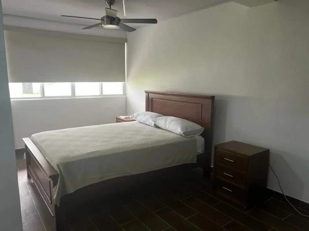 Private backyard with green lawn and soccer goals in Clayton neighborhood Panama