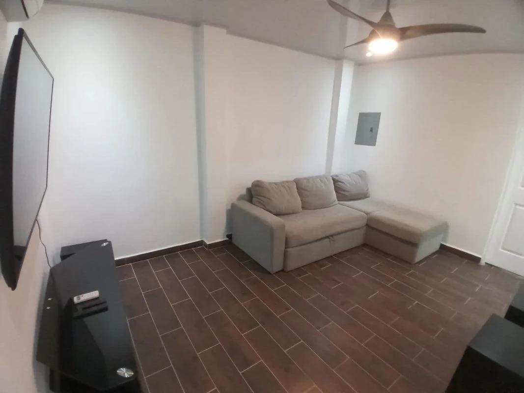 Bedroom with neutral decor and garden view in Los Rios Panama