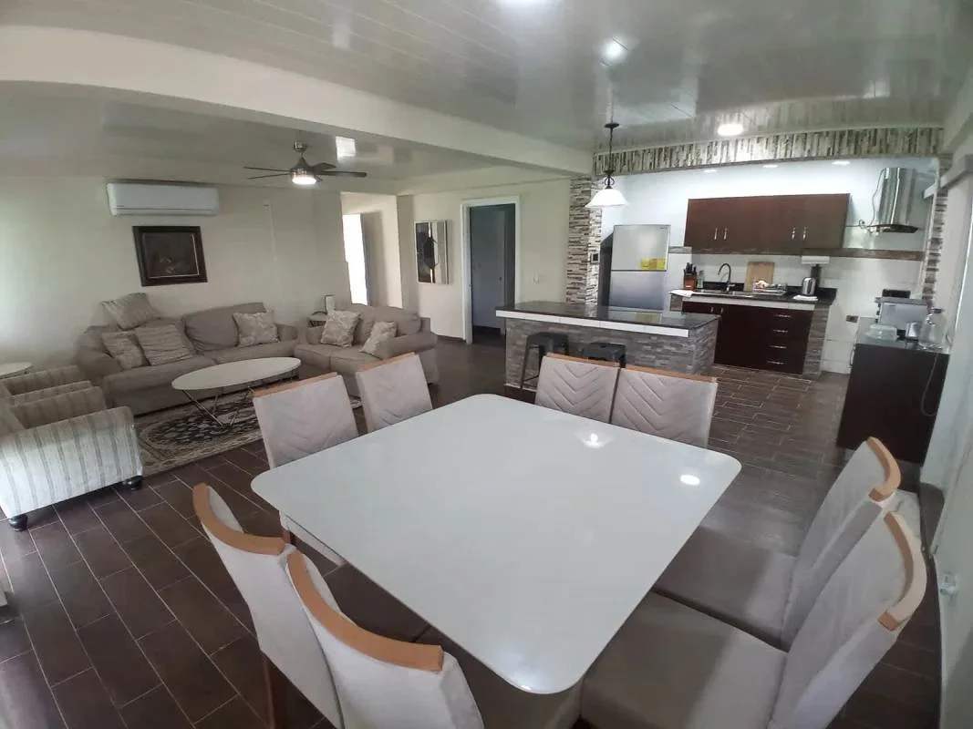 Bathroom with large shower, mirror and window for natural light in Panama City