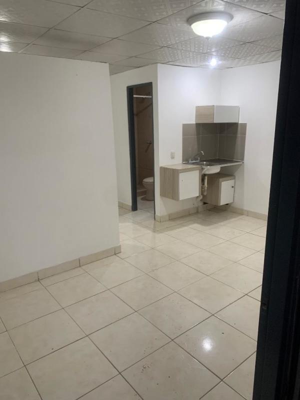 Interior tiled floor studio apartment with kitchenette Mateo Iturralde San Miguelito Panama