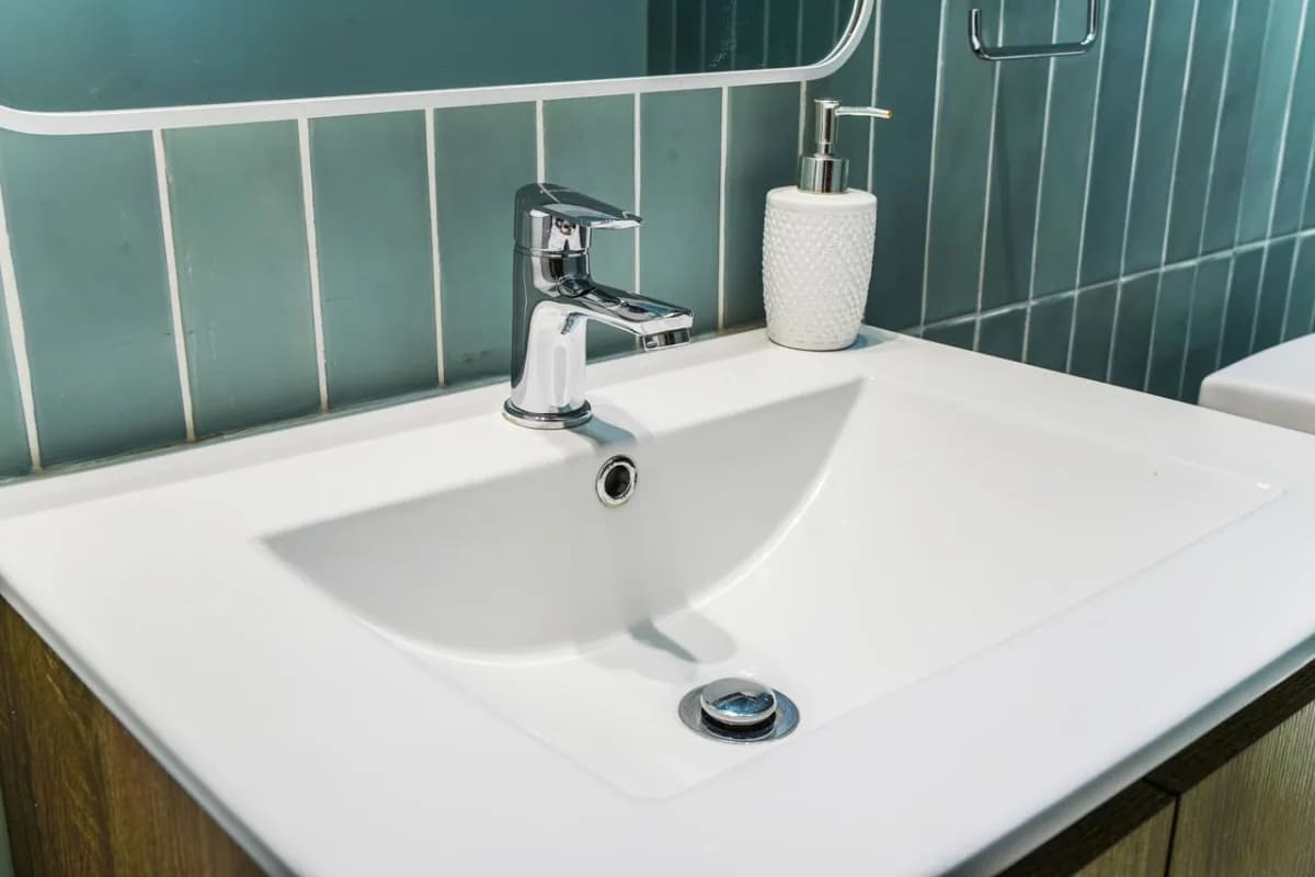 Open kitchen with appliances, breakfast bar, wood accents in PH Casco Viejo Residences