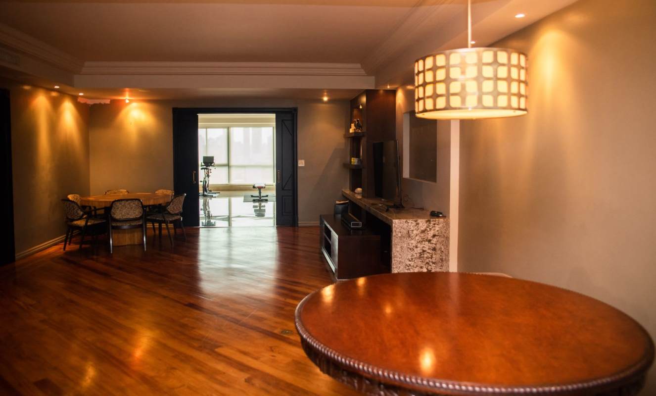 Spacious kitchen black granite island white cabinetry ceiling fan PH Panamar Coco del Mar Panama
