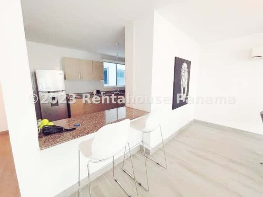 Clean white bathroom with walk-in shower rental loft Bella Vista Panama City