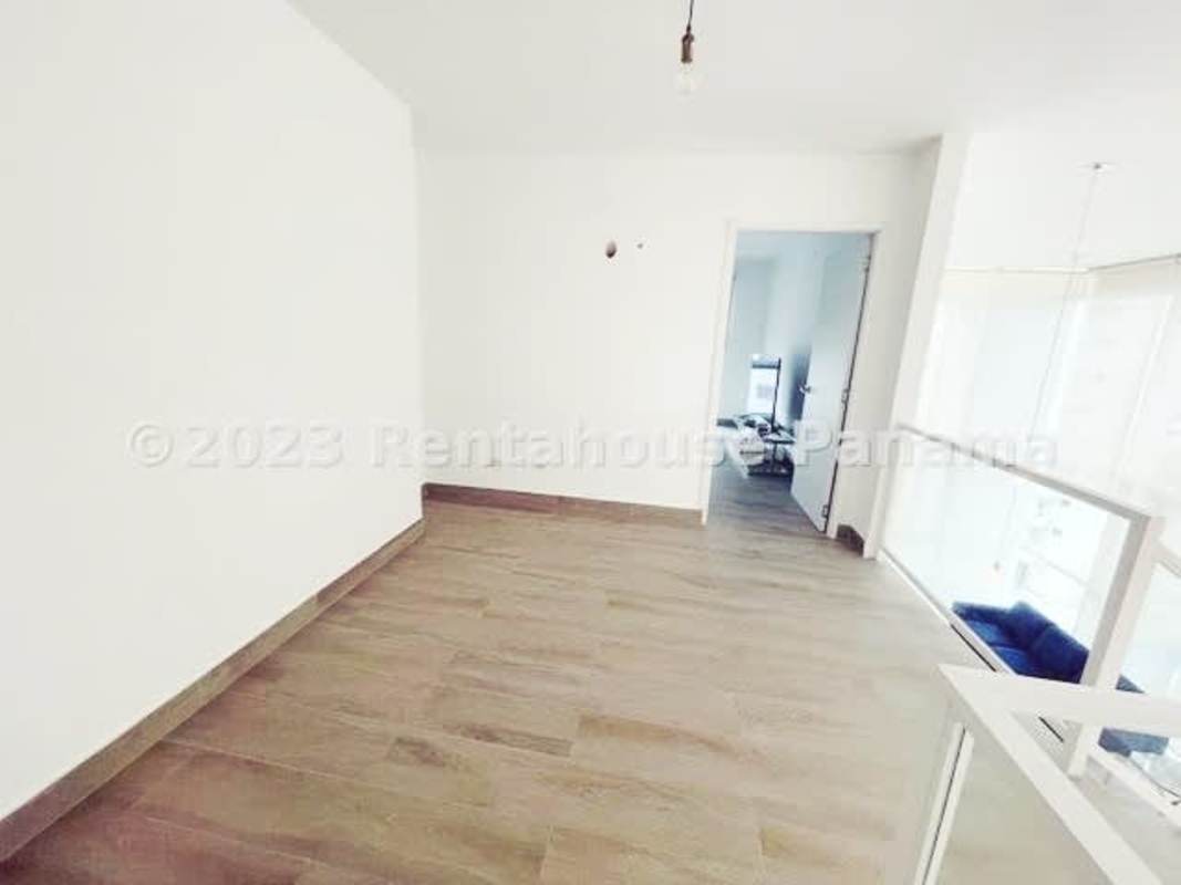 Loft apartment double-height ceilings dining and living area Bella Vista Panama