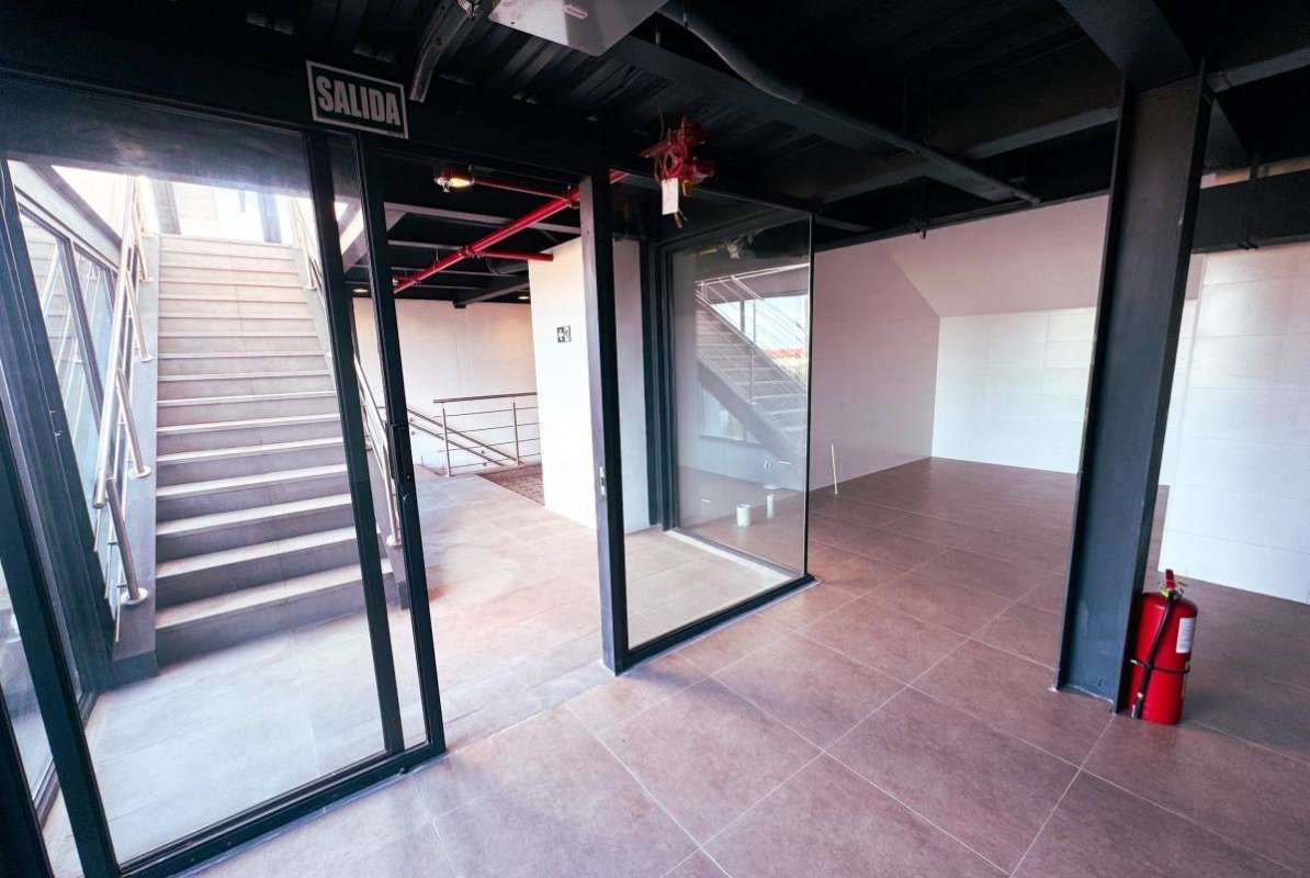 Aerial view historic Casco Viejo Panama with red roof buildings, bay and city skyline