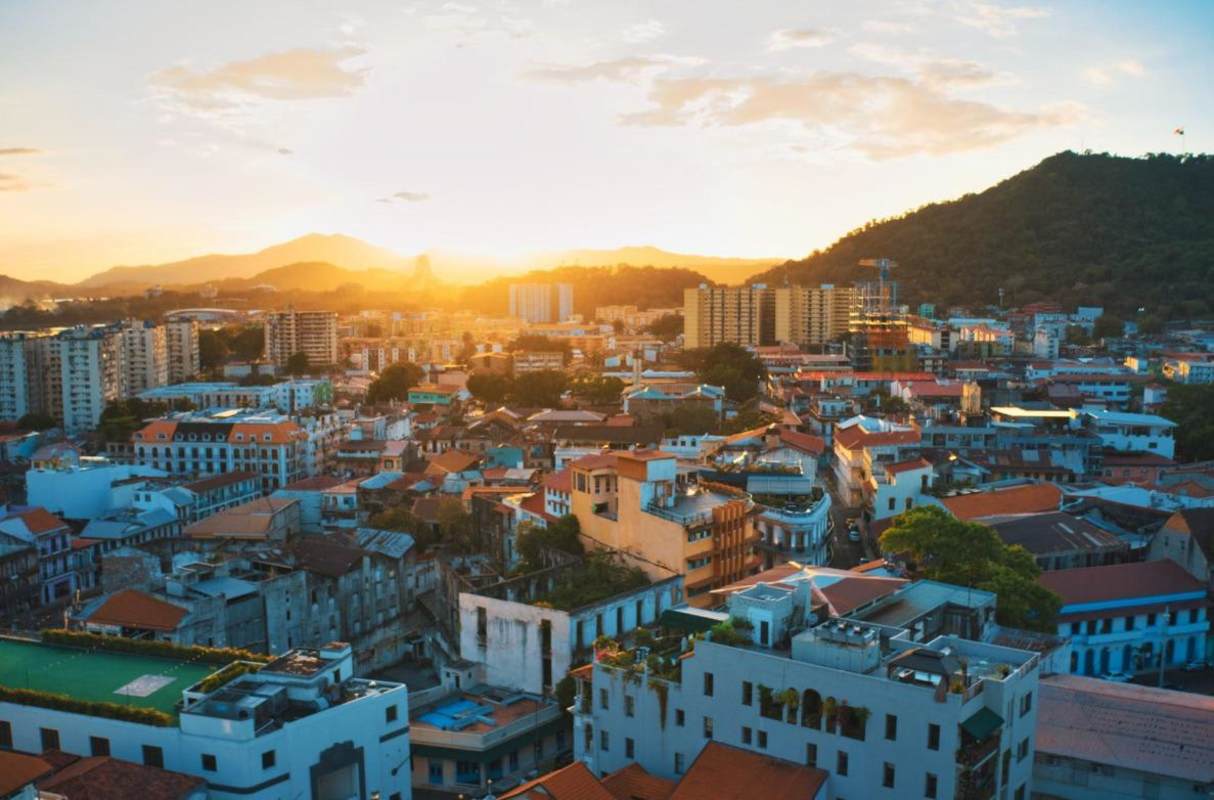 Panama downtown skyline sunset over colonial Casco Viejo rooftops aerial view