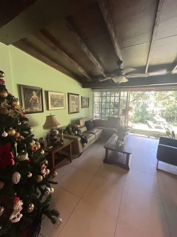 Bright living room exposed beams large space Curundu Heights Panama luxury resident house sale