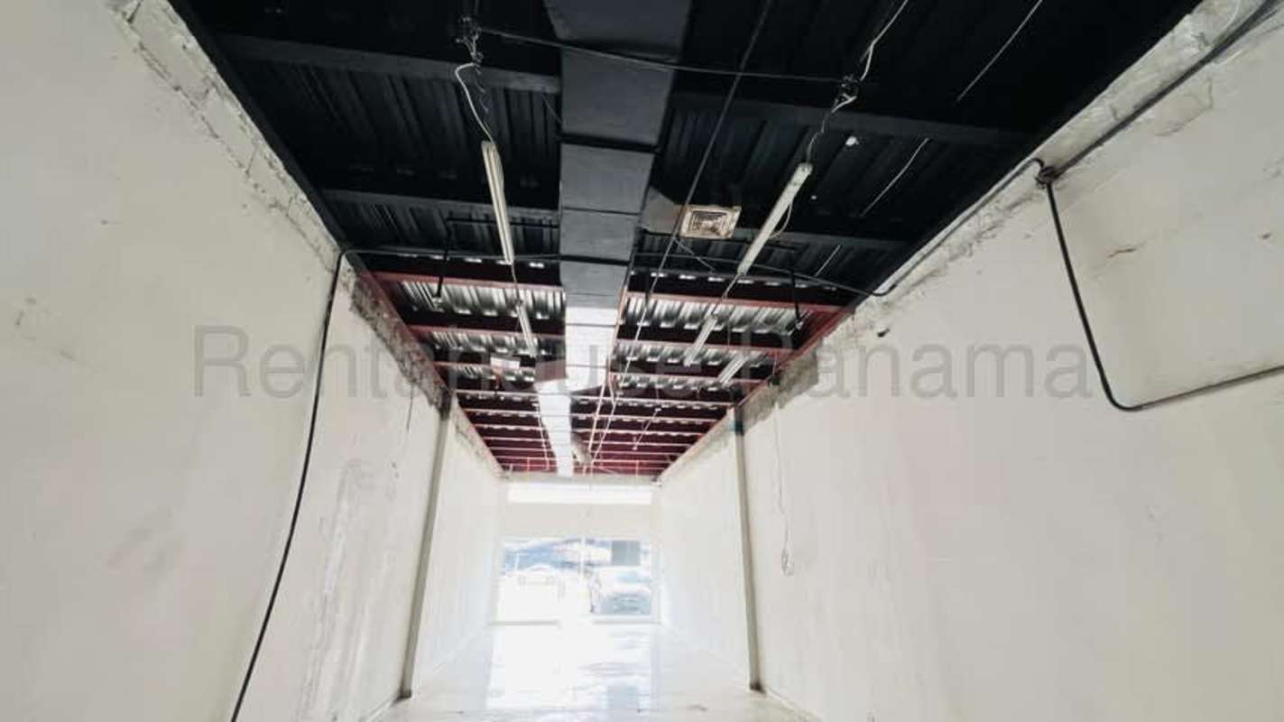 Commercial interior with large entrance unfinished ceiling garage open Costa del Este Panama
