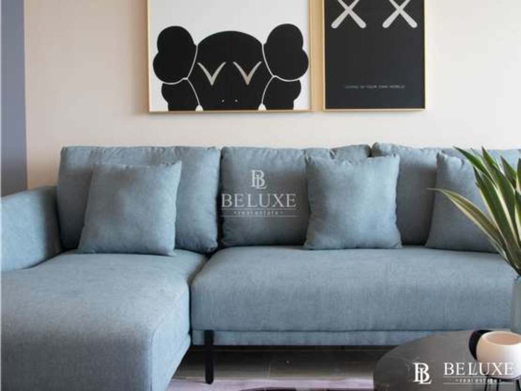 Resort-style pool area surrounded by gardens at PH The Regent Costa del Este Panama City