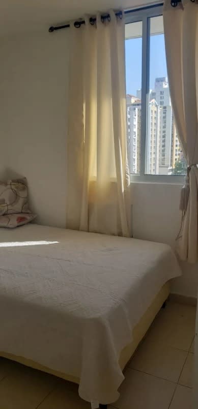 Bright bedroom large window skyline view PH Plaza 77 El Cangrejo Panama City