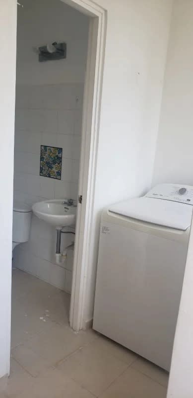 Modern open dining and living room with balcony city view PH Plaza 77 Panama