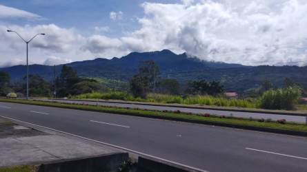 Flat farmland near Boquete on major highway frontage Panamanian countryside