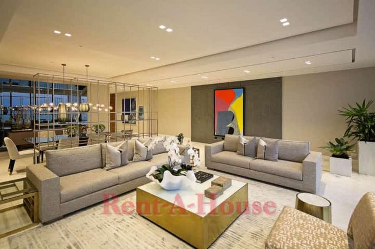 Master bedroom luxury condo with floor-to-ceiling windows oceanfront PH Aqualina Panama