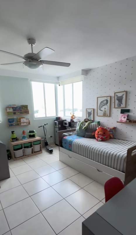 Children's bedroom pastel colors large window ceiling fan PH Titanium Tower San Francisco Panama