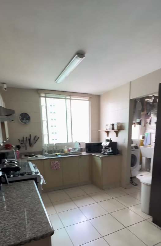 Master bedroom with chandelier TV walk-in closets PH Titanium Tower San Francisco Panama