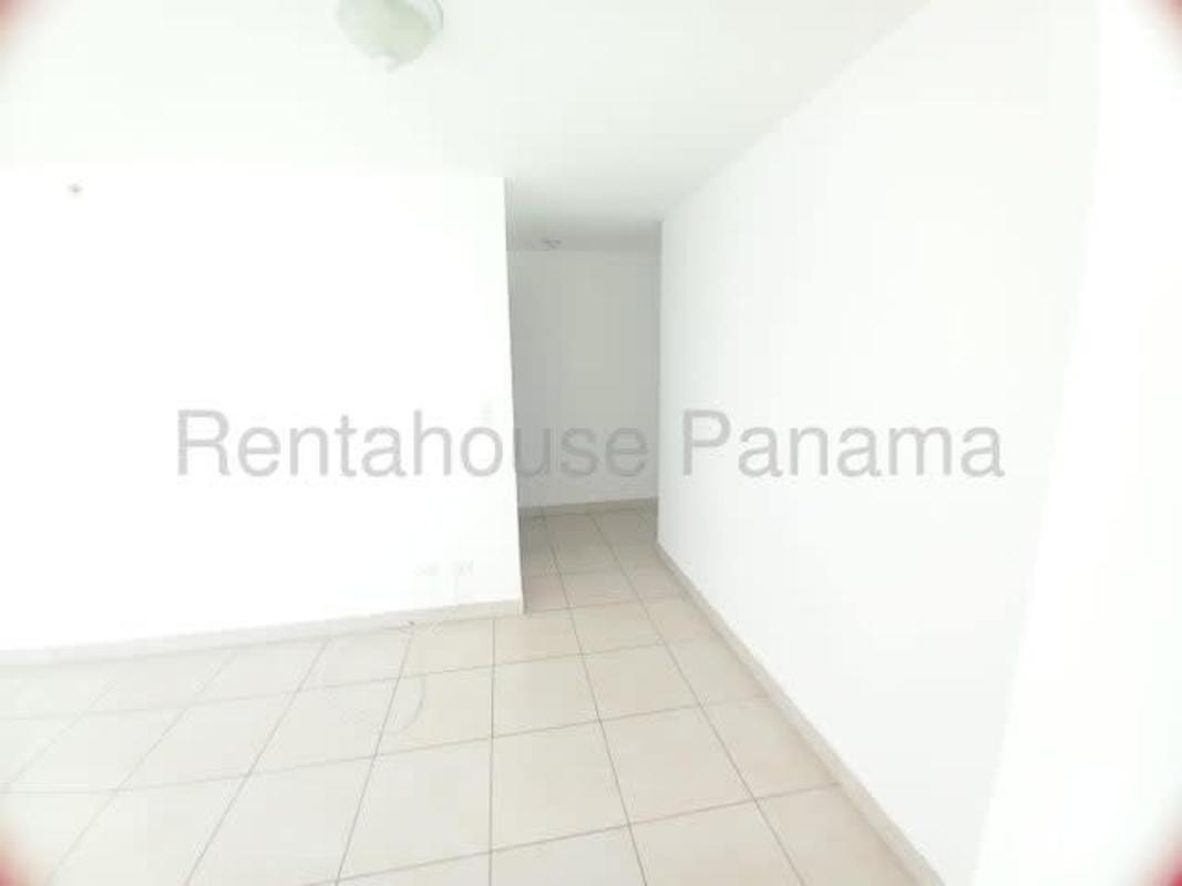 Hallway leading to multiple bedrooms with ceramic tile flooring at PH Edison Park Panama City