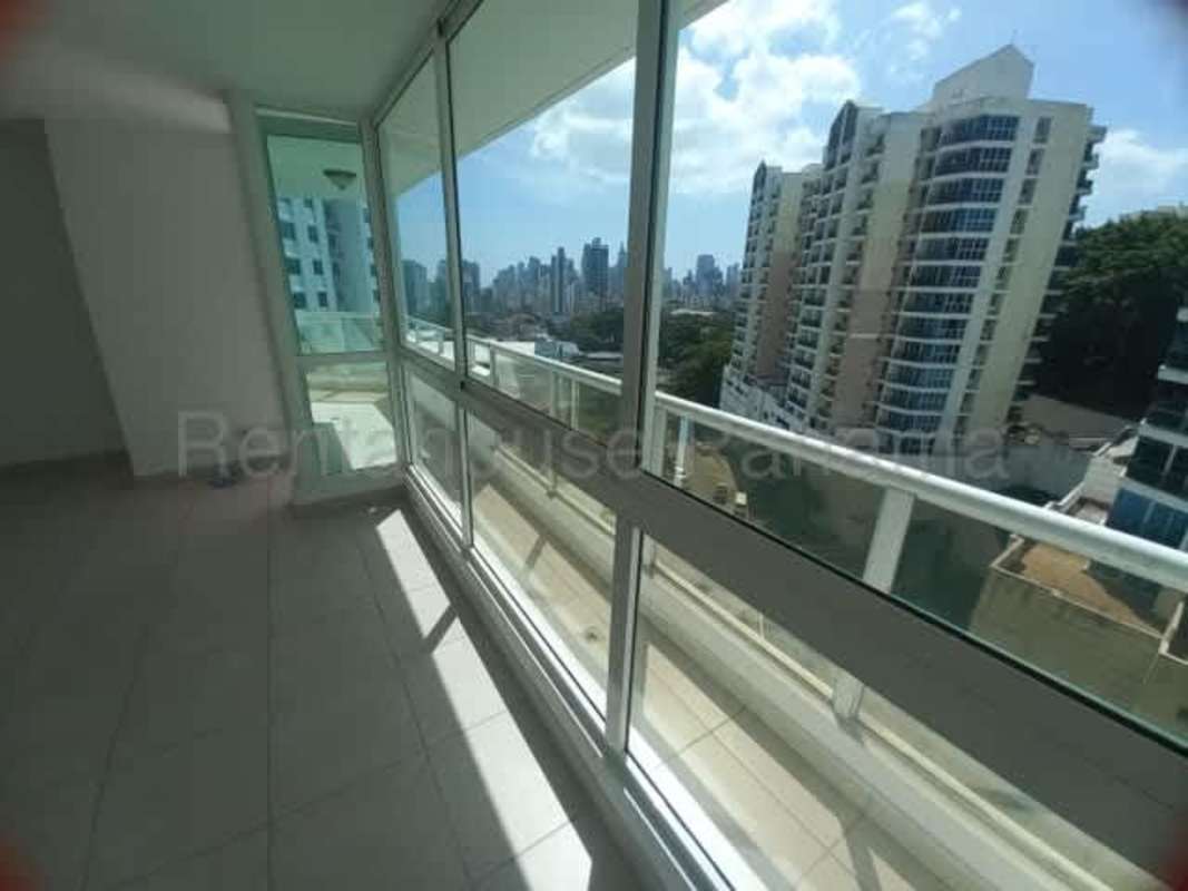 Panoramic city view seen from enclosed balcony of PH Edison Park high rise Panama