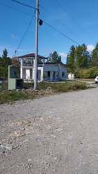 View of large flat grassy lot with mountains ideal for building Las Trancas Boquete Panama