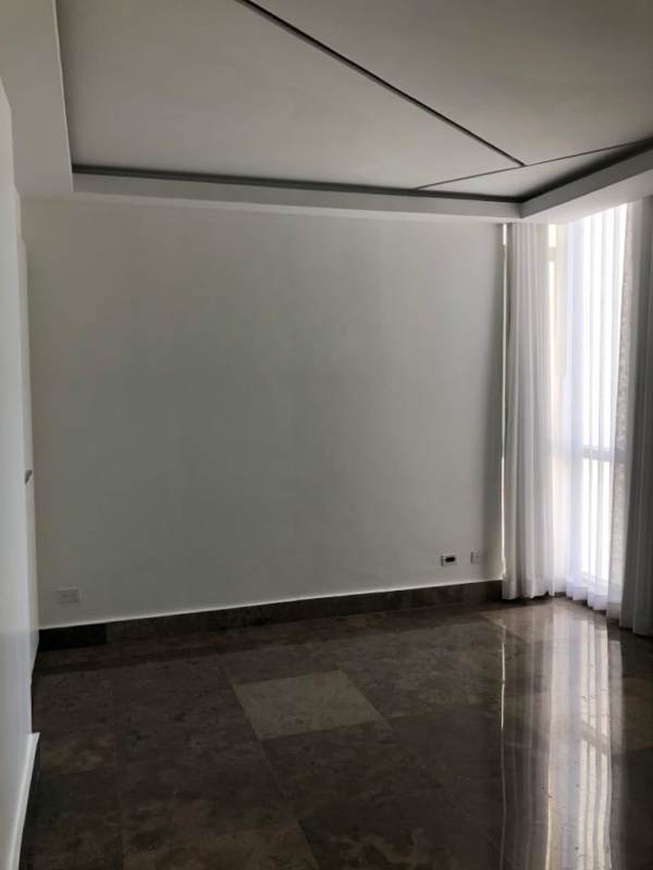 Spacious open plan dining and kitchen zone with marble floors at YOO Panama