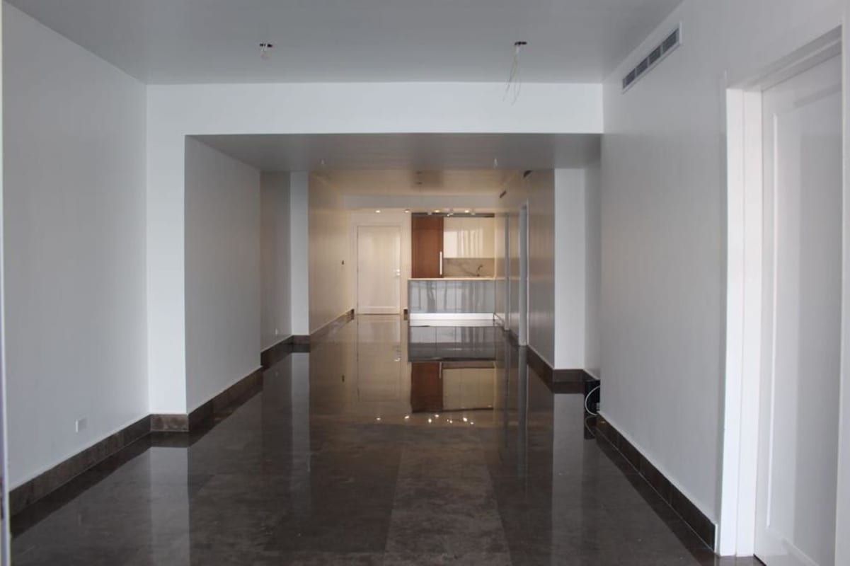 Private terrace with heavy glass railings and skyline views from luxury condo YOO Panama