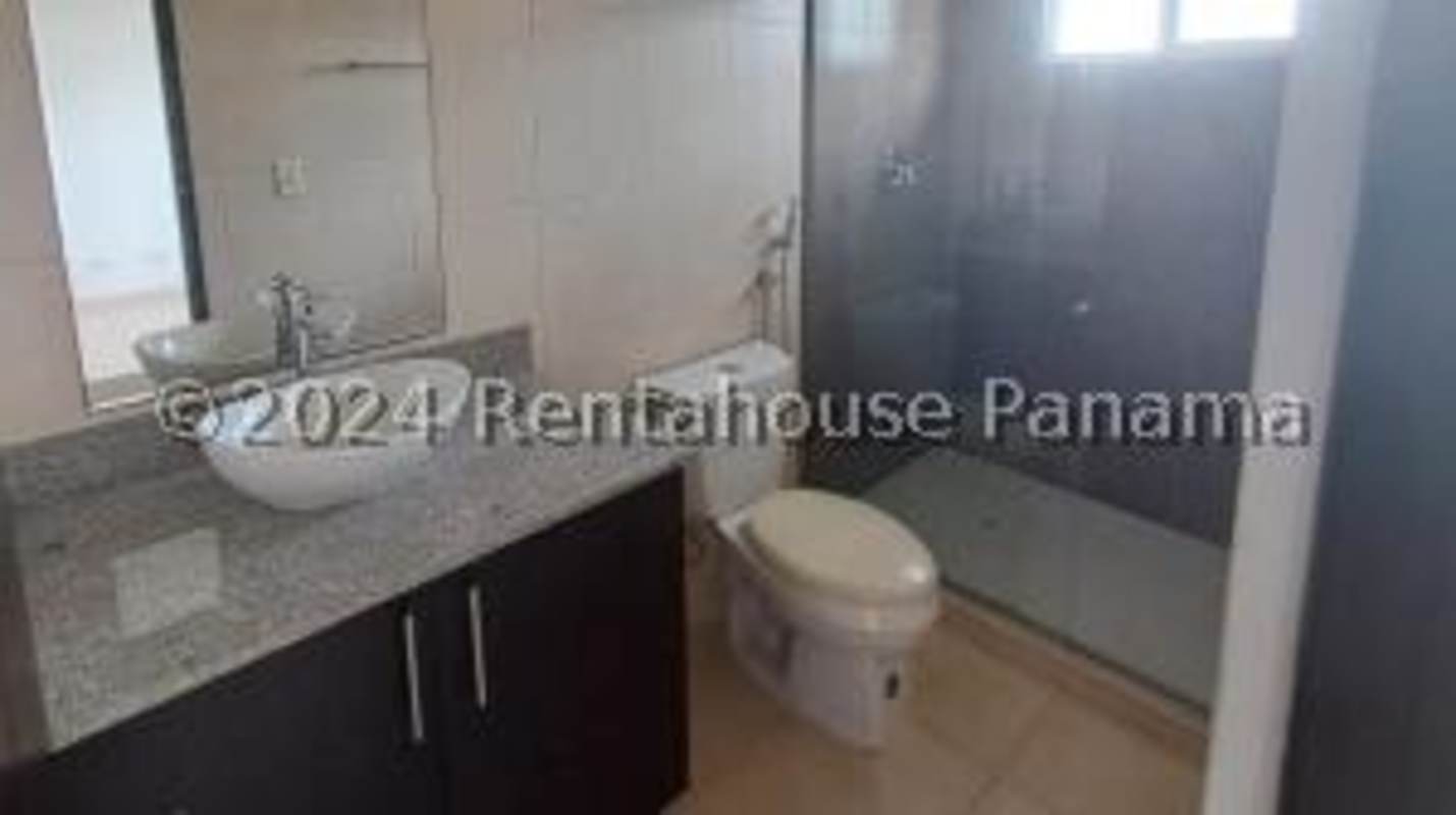 Contemporary living room with tile flooring and lots of natural light in Villa Alta Brisas del Golf Panama