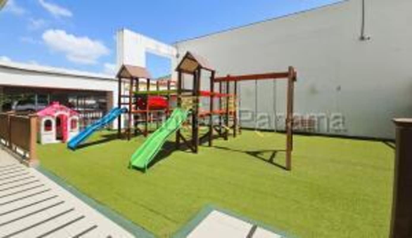 Wooden deck synthetic grass outdoor area PH Lefevre 75 apartment complex Panama