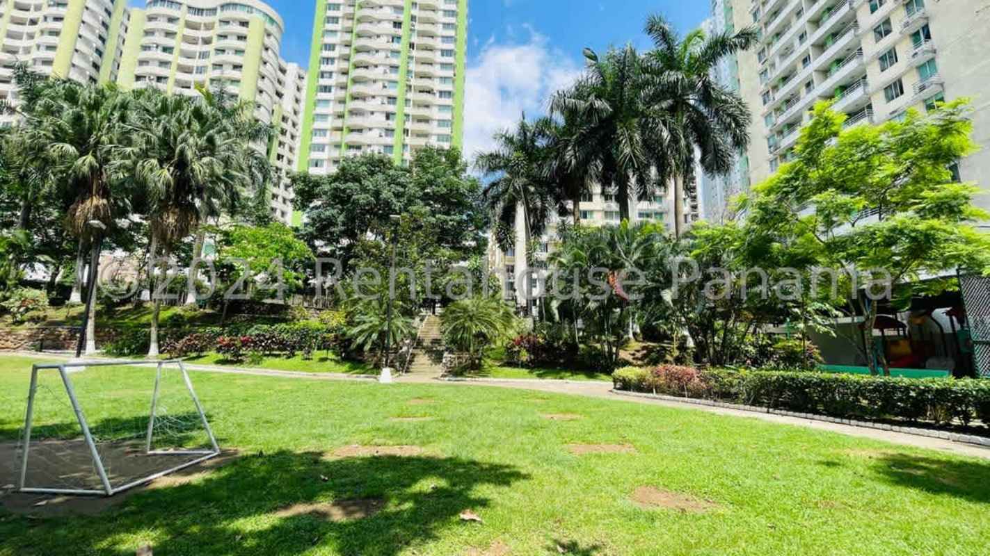 Modern kitchen with cabinets, washer area and window in PH Green Park Tower Condado del Rey Panama City