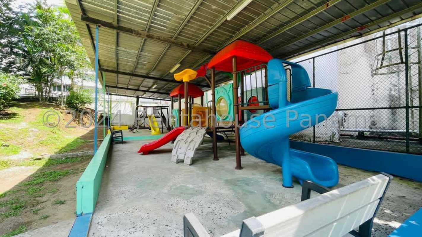 Outdoor swimming pool surrounded by deck lounge chairs at PH Green Park Condado del Rey