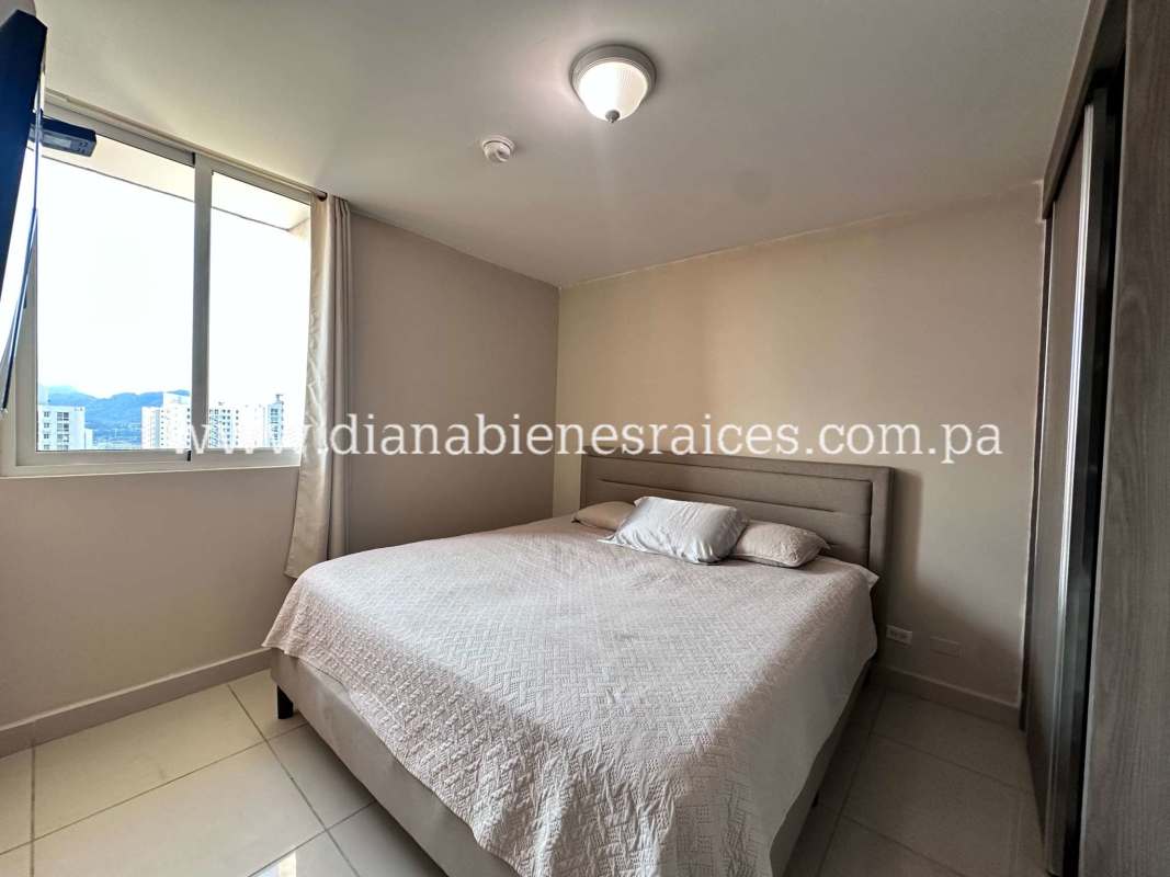 Bedroom with panoramic window, built-in closet, AC unit at Condado Country Club Panama