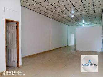Office or retail commercial interior partitioned with tiled floor and fluorescent lighting in Bugaba Panama