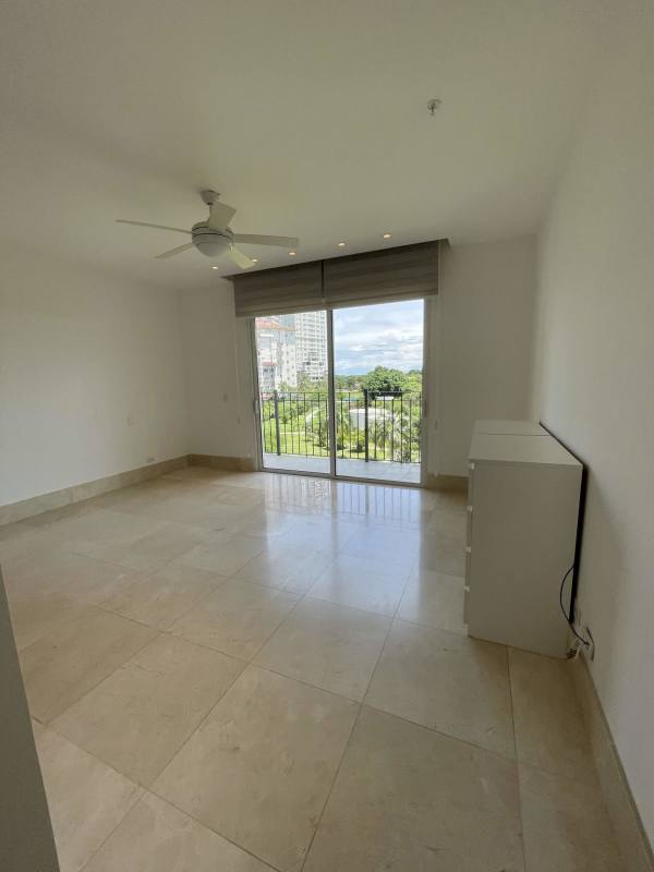 Contemporary kitchen with center island, stainless appliances in luxury condo The Reserve Santa María Panama City