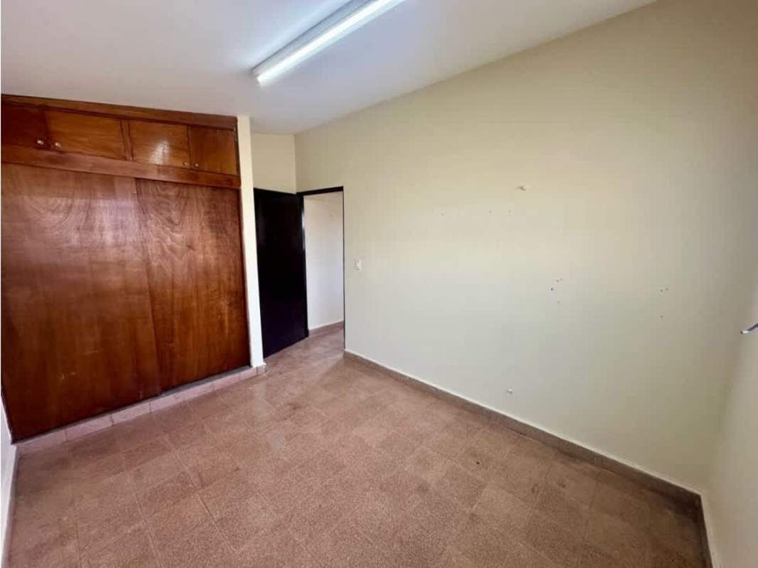 Spacious backyard with grass fenced privacy rental house Chanis Panama City