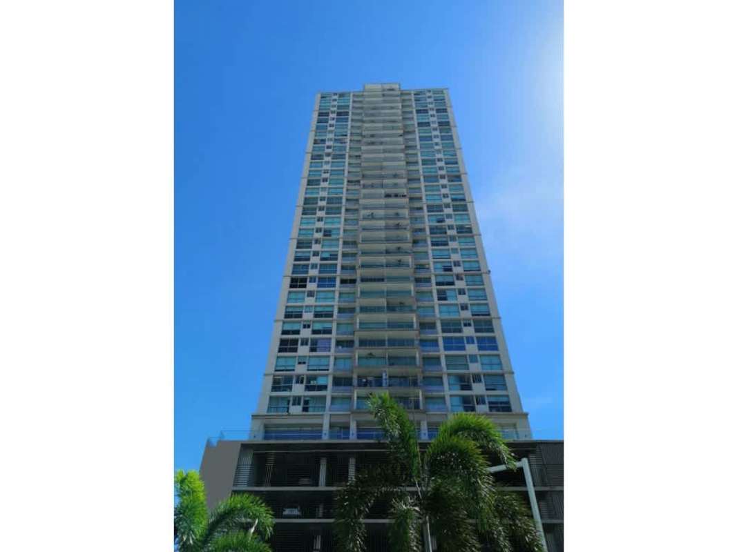 High-rise condo PH Bali with glass balconies and palm trees at Costa del Este Panama