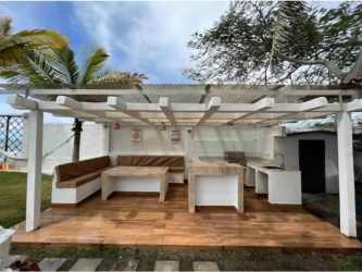 Coastal outdoor kitchen and dining pergola at beachfront villa Nueva Gorgona Panama